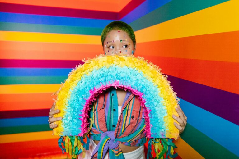 Orange County Kids Party Blog! 7 Girl holding colorful pinata