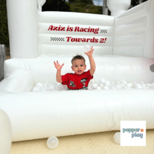 Toddler Boy in Bounce House