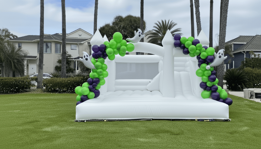 Turn Up Your Halloween Party in Orange County with Soft Play and Kids Party Rentals 2 bounce house ghost balloons